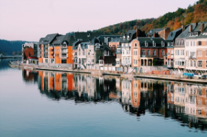 Image of colorful houses by a body of water